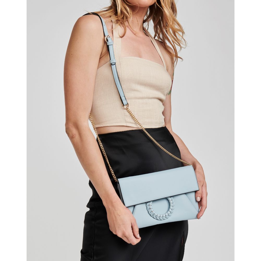 Woman wearing Sky Blue Moda Luxe Harper Crossbody 842017124603 View 1 | Sky Blue