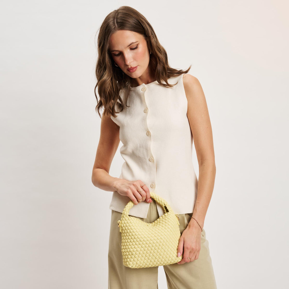 Woman wearing Butter Moda Luxe Jessamine Crossbody 842017141310 View 1 | Butter