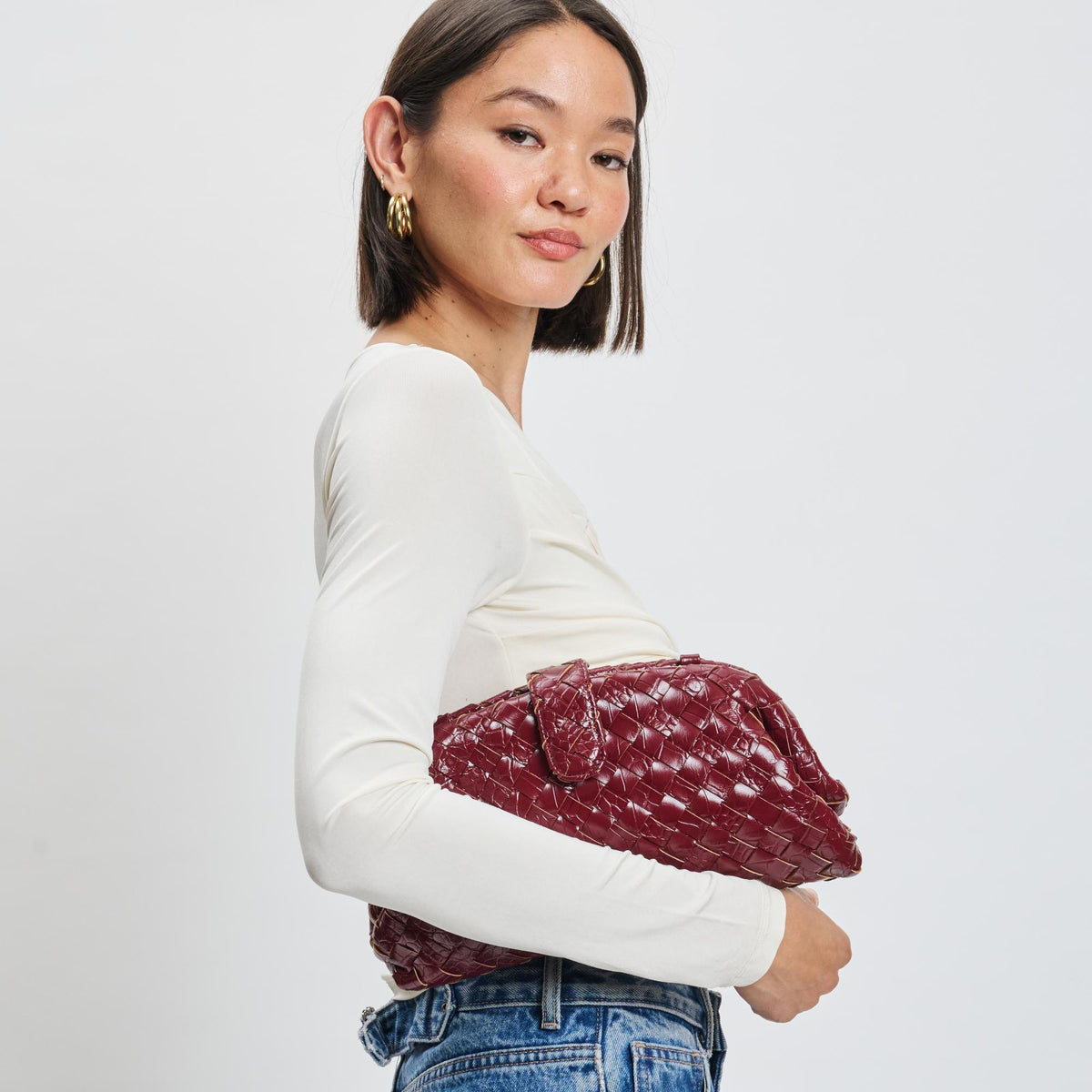 Woman wearing Red Sol and Selene GiGi Crossbody 842017139607 View 1 | Red