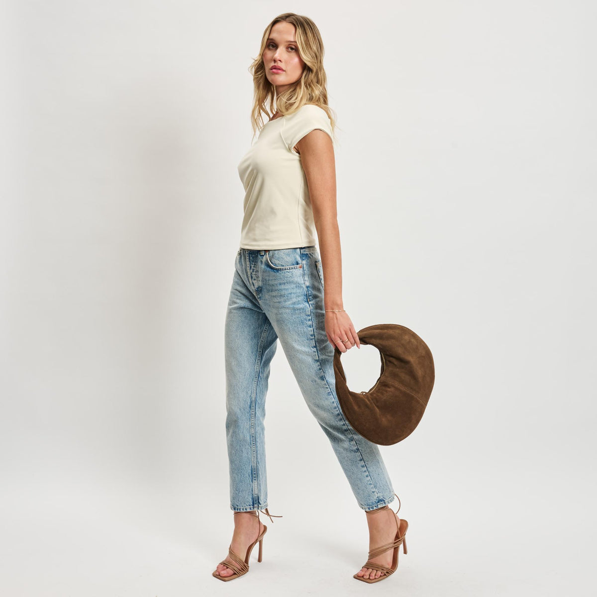 Woman wearing Chocolate Moda Luxe Farrah - Suede Hobo 842017138631 View 3 | Chocolate