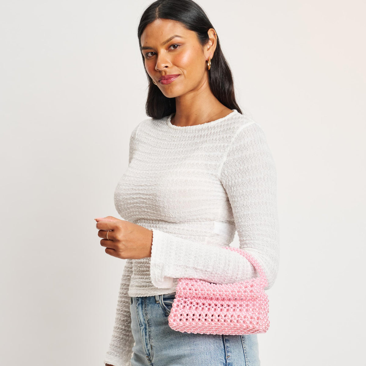 Woman wearing Pink Moda Luxe Darcy Evening Bag 842017132653 View 2 | Pink