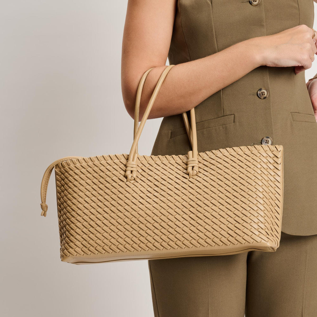 Woman wearing Natural Moda Luxe Nola Tote 842017140870 View 1 | Natural