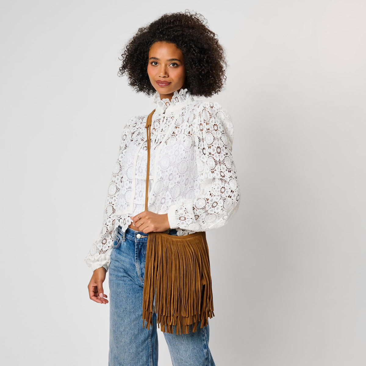 Woman wearing Caramel Moda Luxe Arizona Crossbody 842017142324 View 1 | Caramel