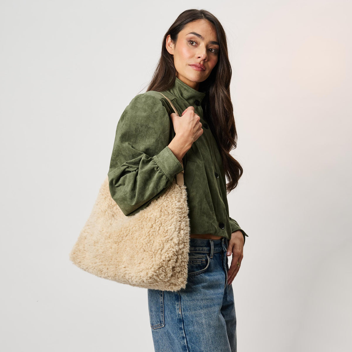 Woman wearing Cream Moda Luxe Neve Sherpa Tote 842017142454 View 1 | Cream