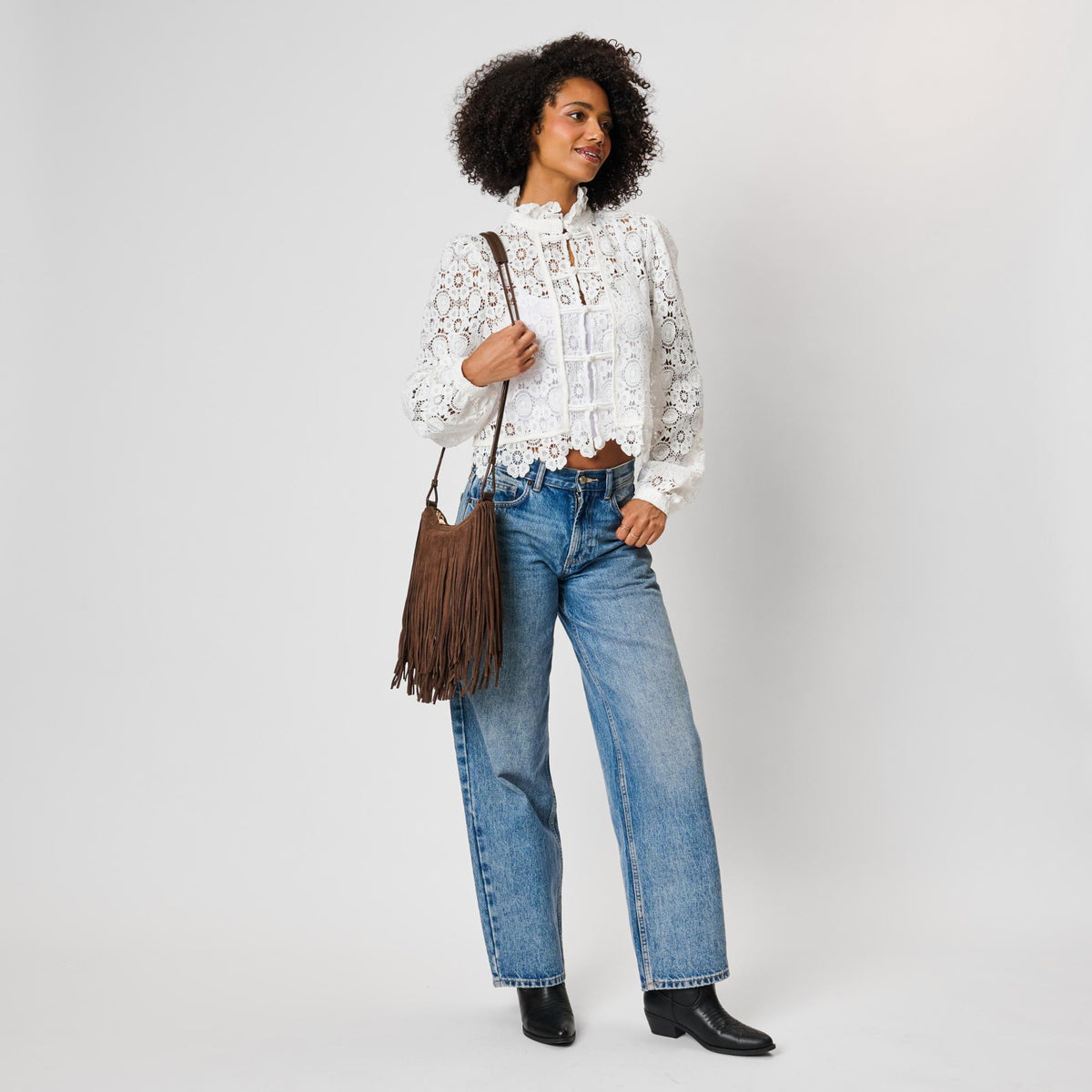 Woman wearing Chocolate Moda Luxe Arizona Crossbody 842017142317 View 4 | Chocolate