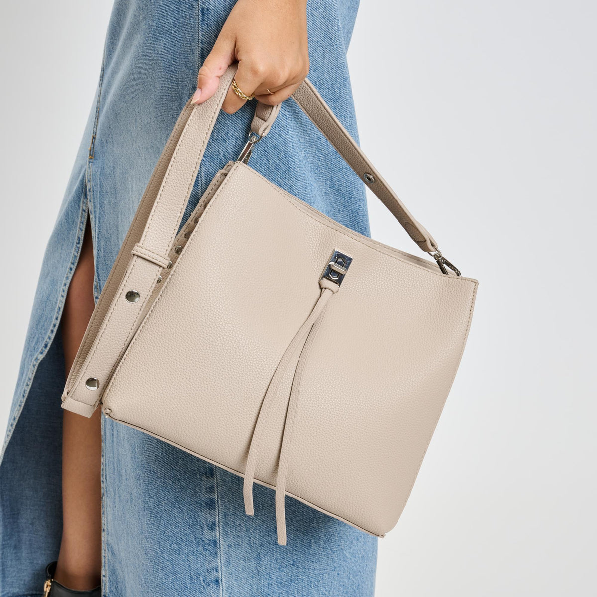 Woman wearing Almond Moda Luxe Eliza Crossbody 842017136064 View 4 | Almond