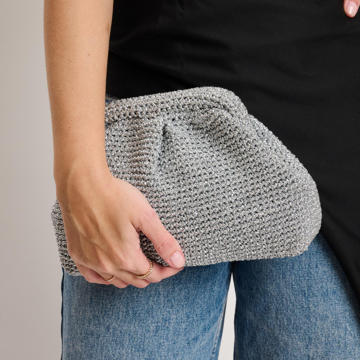 Woman wearing Silver Moda Luxe Amelia Clutch 842017140993 View 1 | Silver