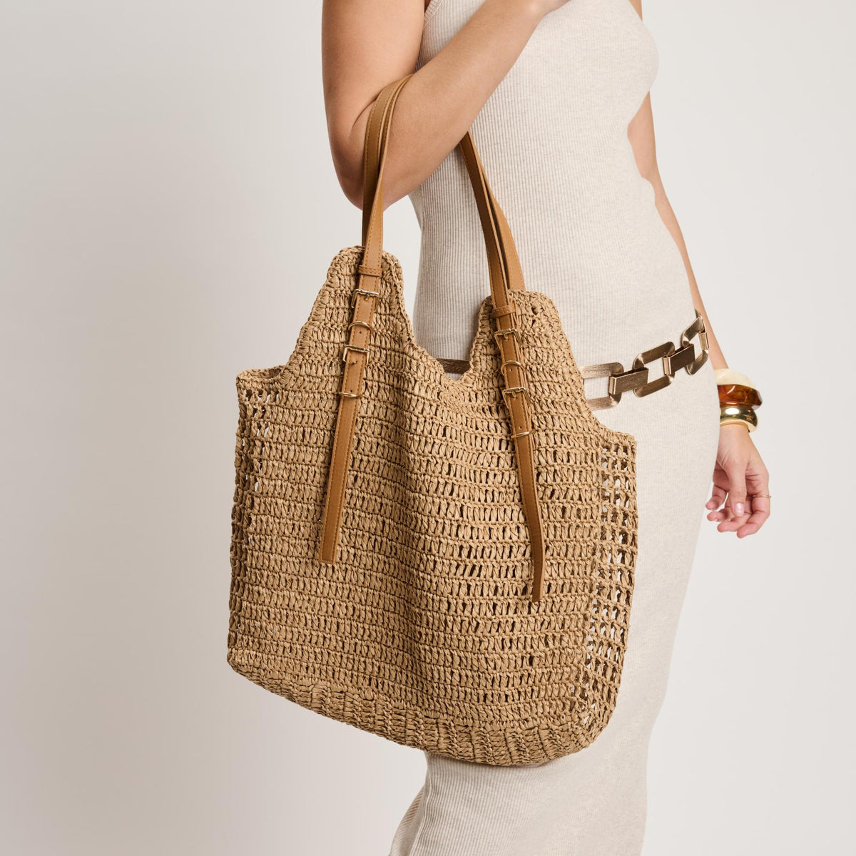 Woman wearing Natural Moda Luxe Reina Tote 842017140733 View 1 | Natural
