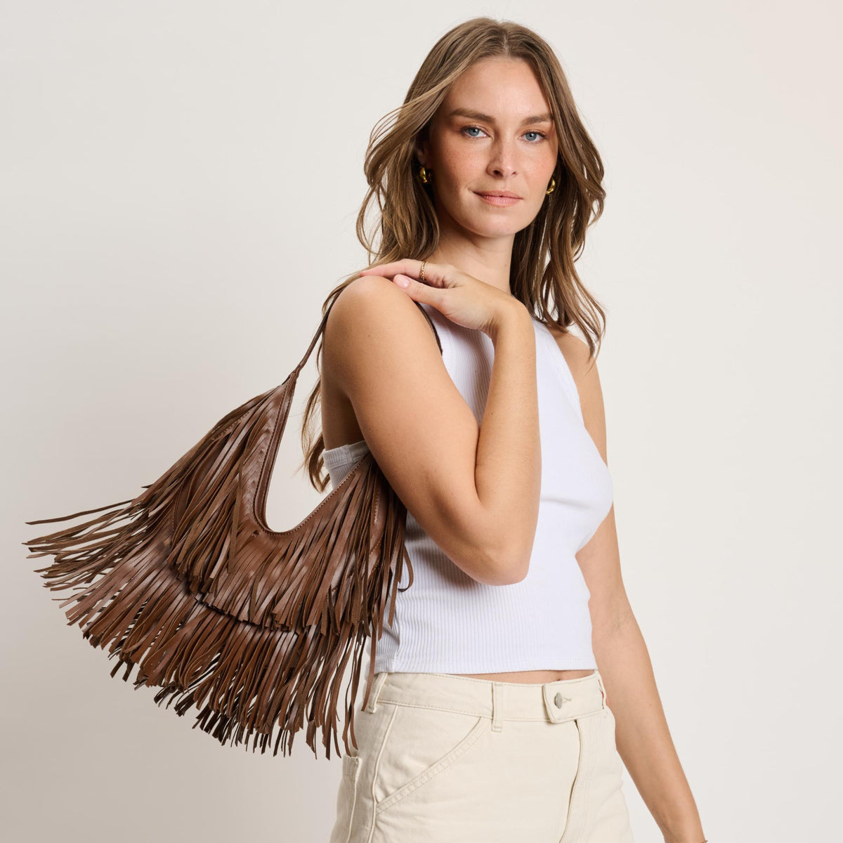 Woman wearing Chocolate Moda Luxe Stevie Hobo 842017141112 View 1 | Chocolate