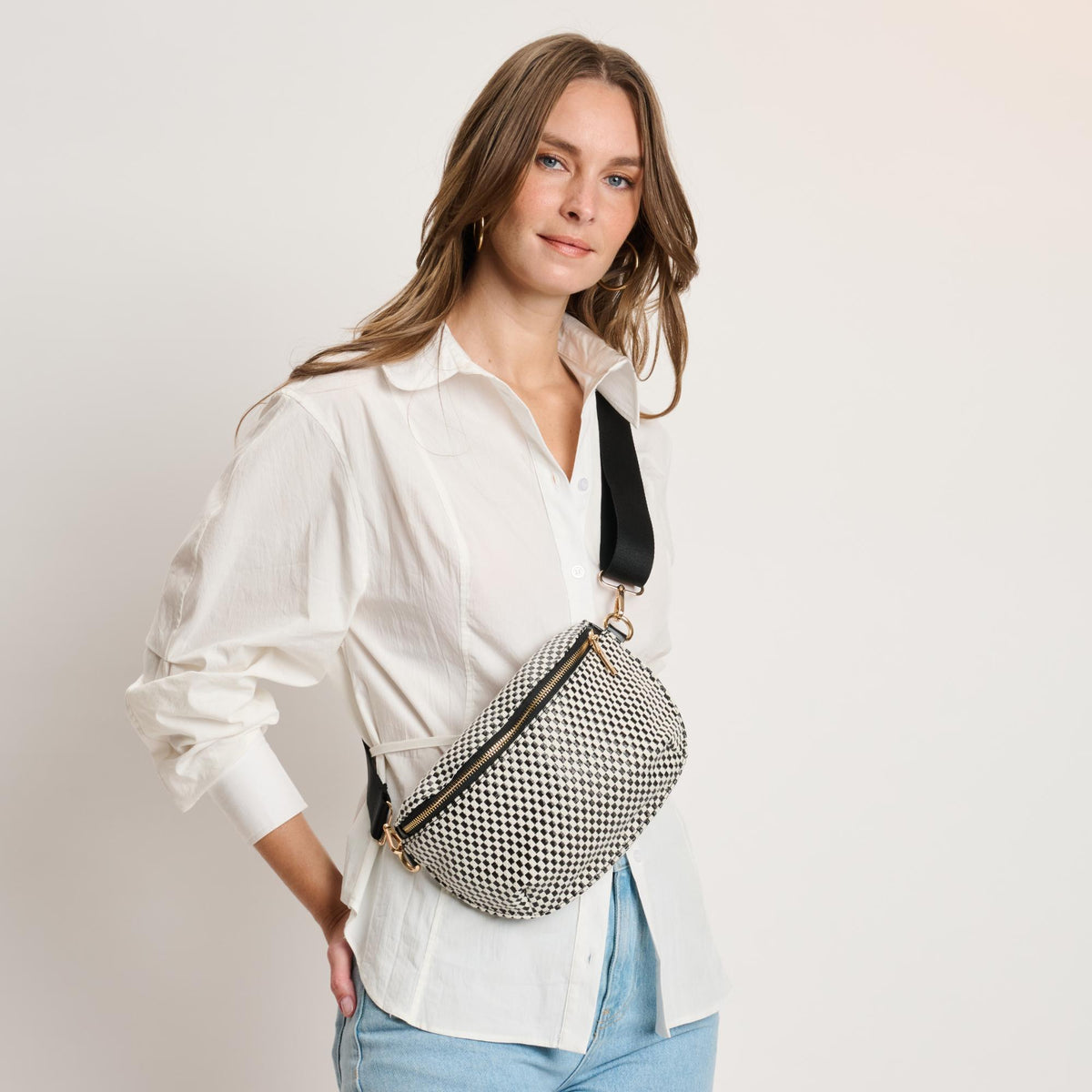 Woman wearing Black White Moda Luxe Gizelle - Small Checker Belt Bag 842017141020 View 2 | Black White