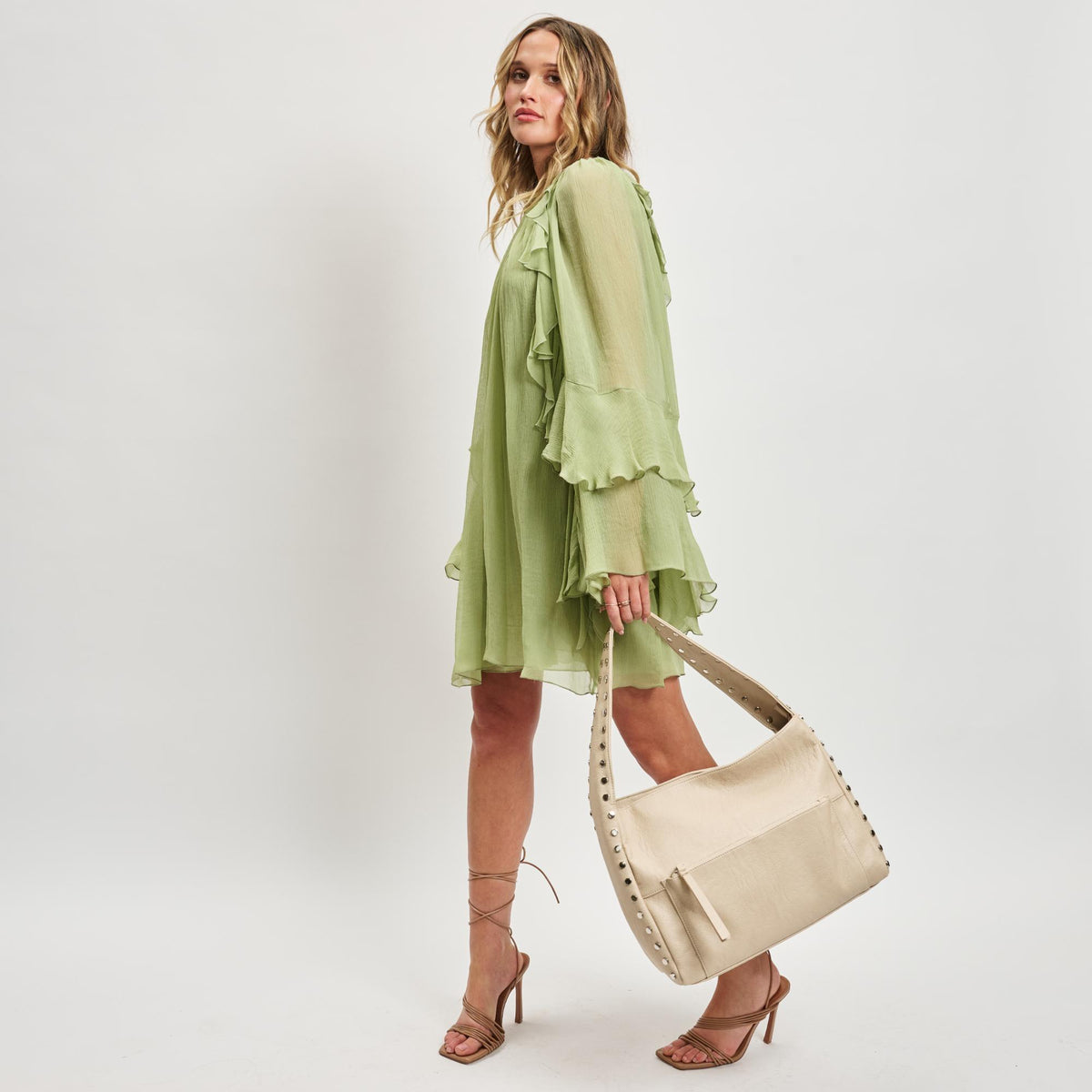 Woman wearing Cream Sol and Selene Misty Hobo 842017137214 View 3 | Cream