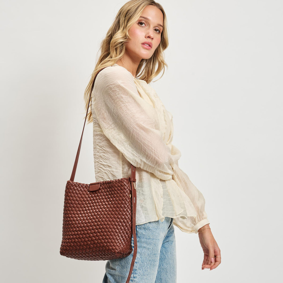 Woman wearing Chocolate Sol and Selene Isadora Bucket 842017137351 View 1 | Chocolate