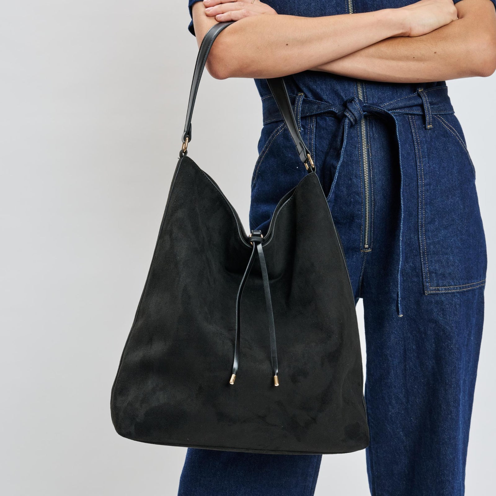 Woman wearing Black Moda Luxe Felicity Hobo 842017139355 View 1 | Black