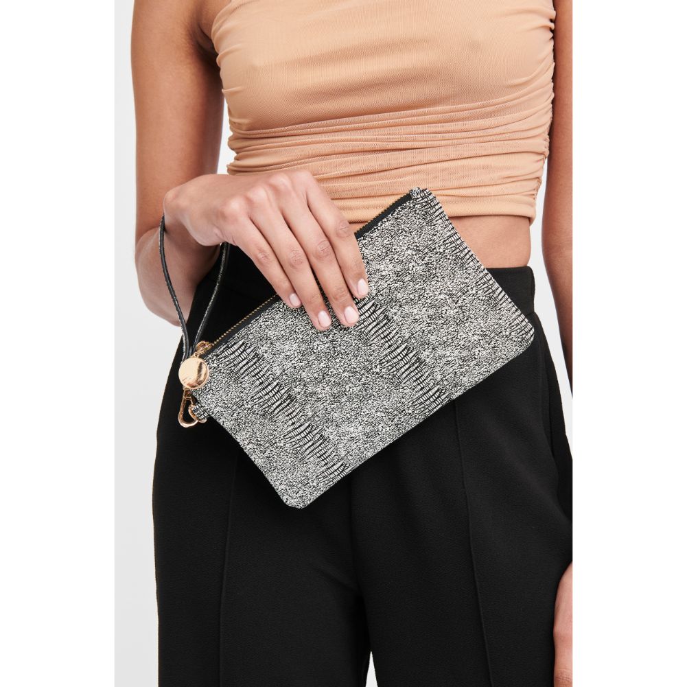 Woman wearing Black White Moda Luxe Olivia Wristlet 842017117957 View 1 | Black White