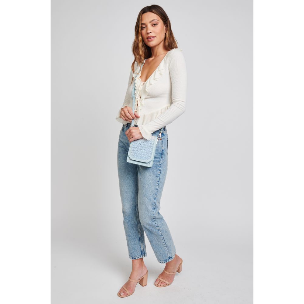 Woman wearing Eggshell Blue Moda Luxe Remi Crossbody 842017124177 View 3 | Eggshell Blue