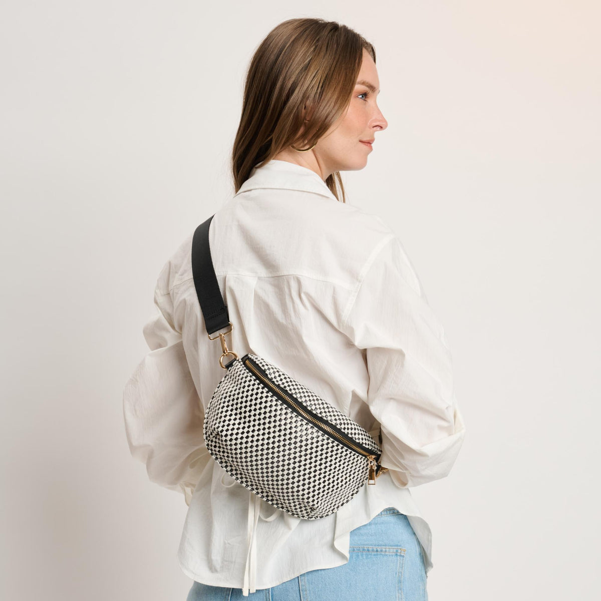 Woman wearing Black White Moda Luxe Gizelle - Small Checker Belt Bag 842017141020 View 3 | Black White