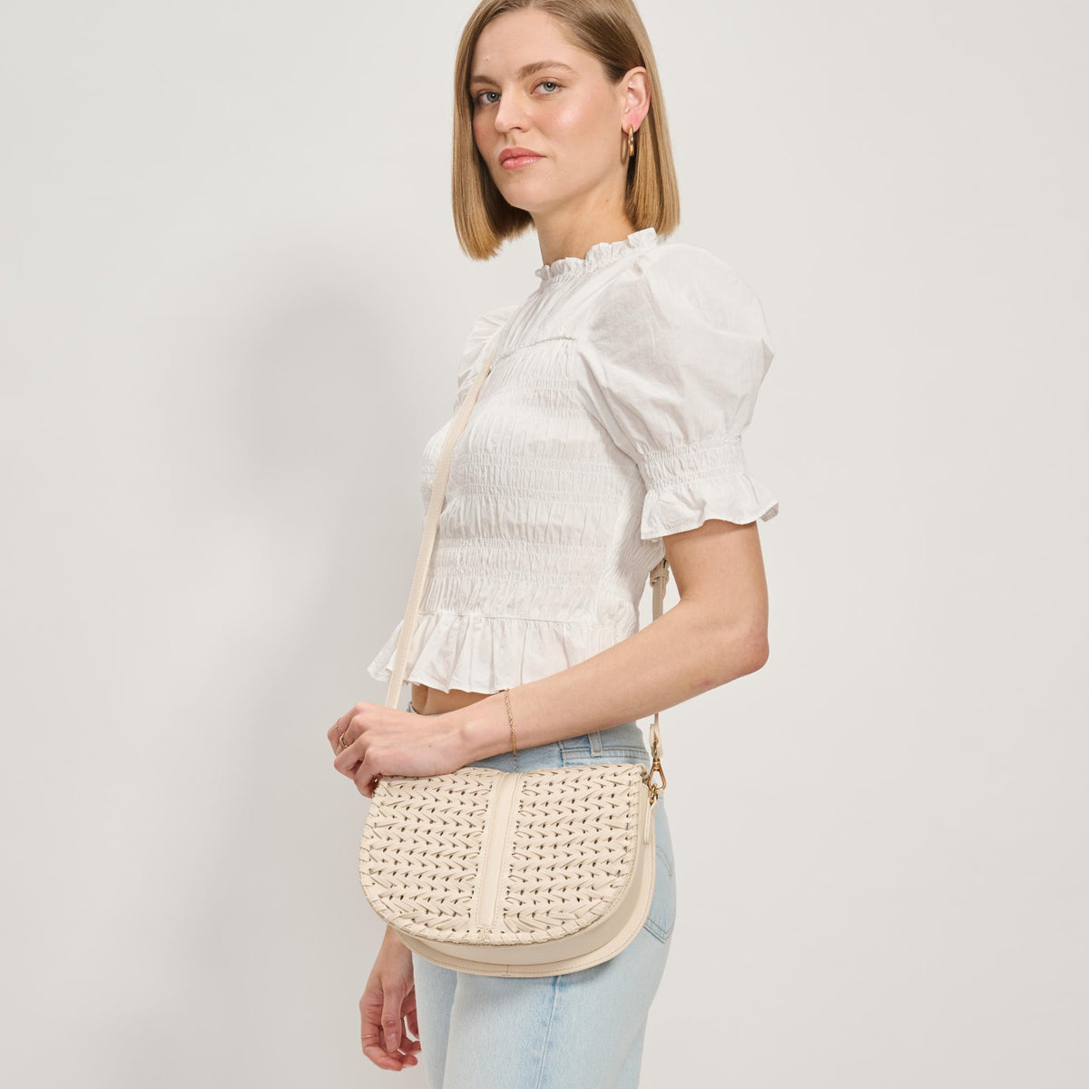 Woman wearing Oatmilk Moda Luxe Cecillia Crossbody 842017137696 View 2 | Oatmilk