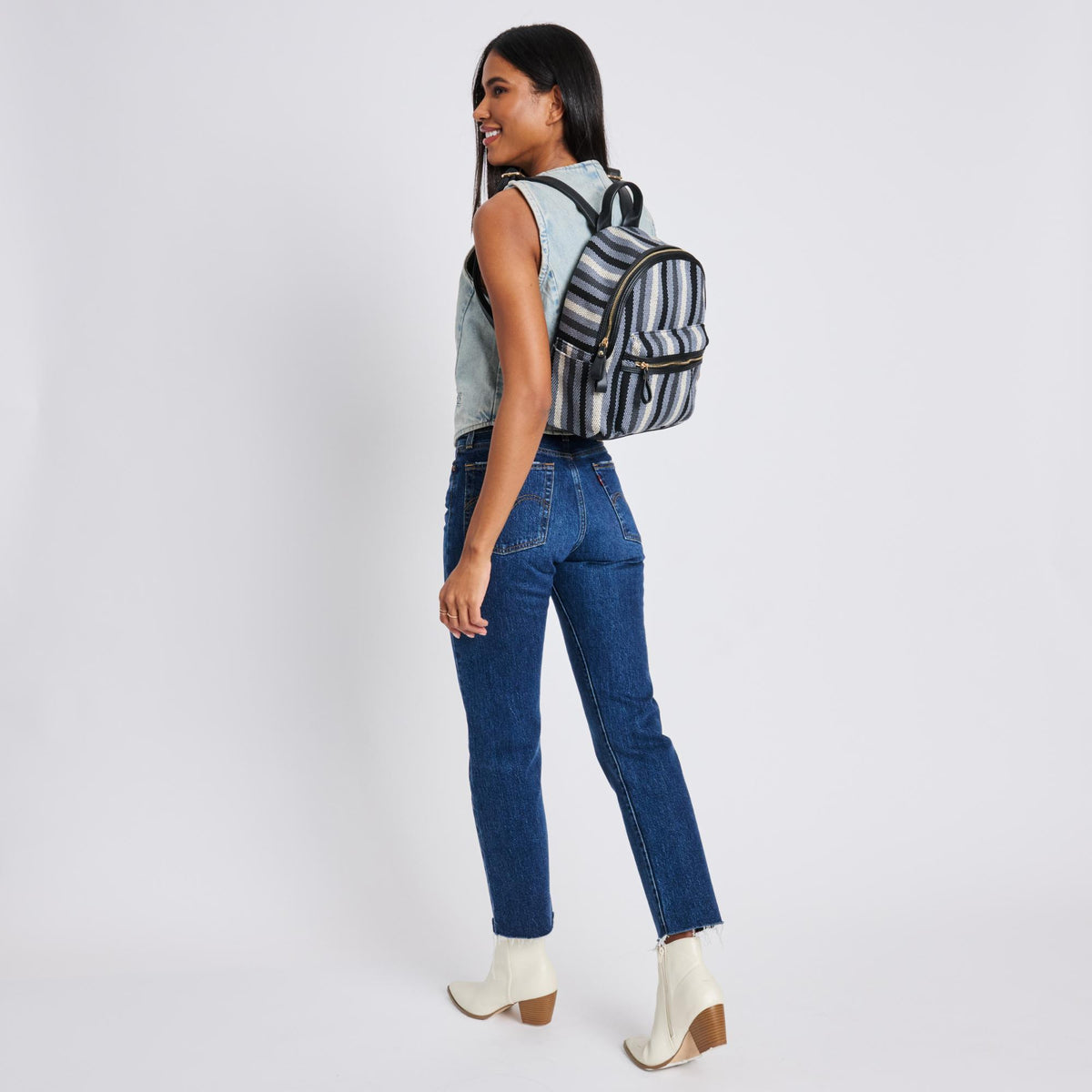 Woman wearing Black Moda Luxe Trent Backpack 842017124436 View 3 | Black