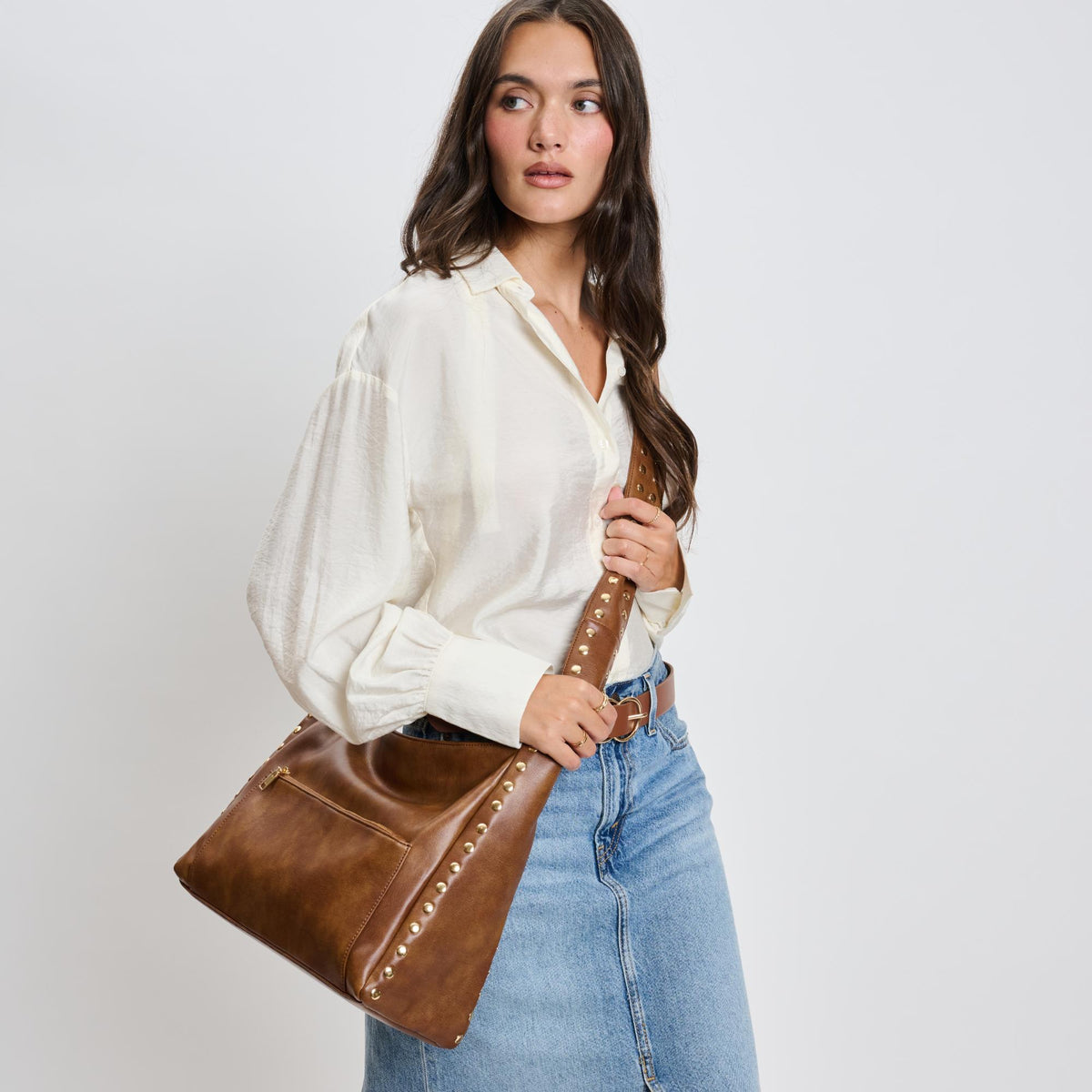 Woman wearing Chocolate Moda Luxe Electra Crossbody 842017136187 View 2 | Chocolate