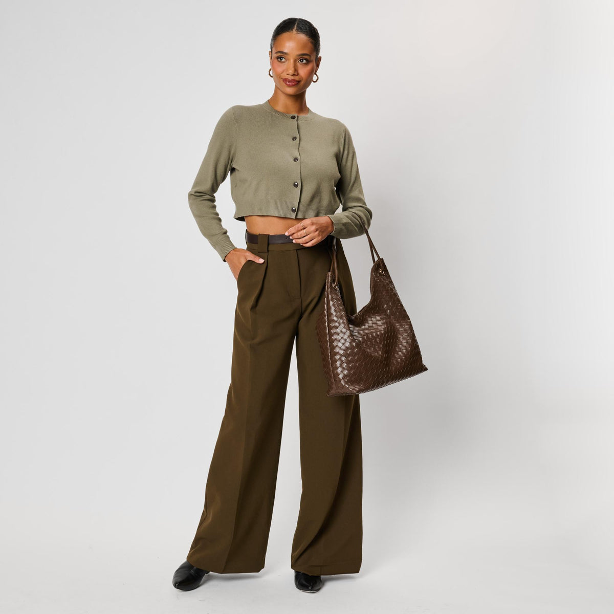 Woman wearing Chocolate Moda Luxe Ezia Hobo 842017142751 View 4 | Chocolate