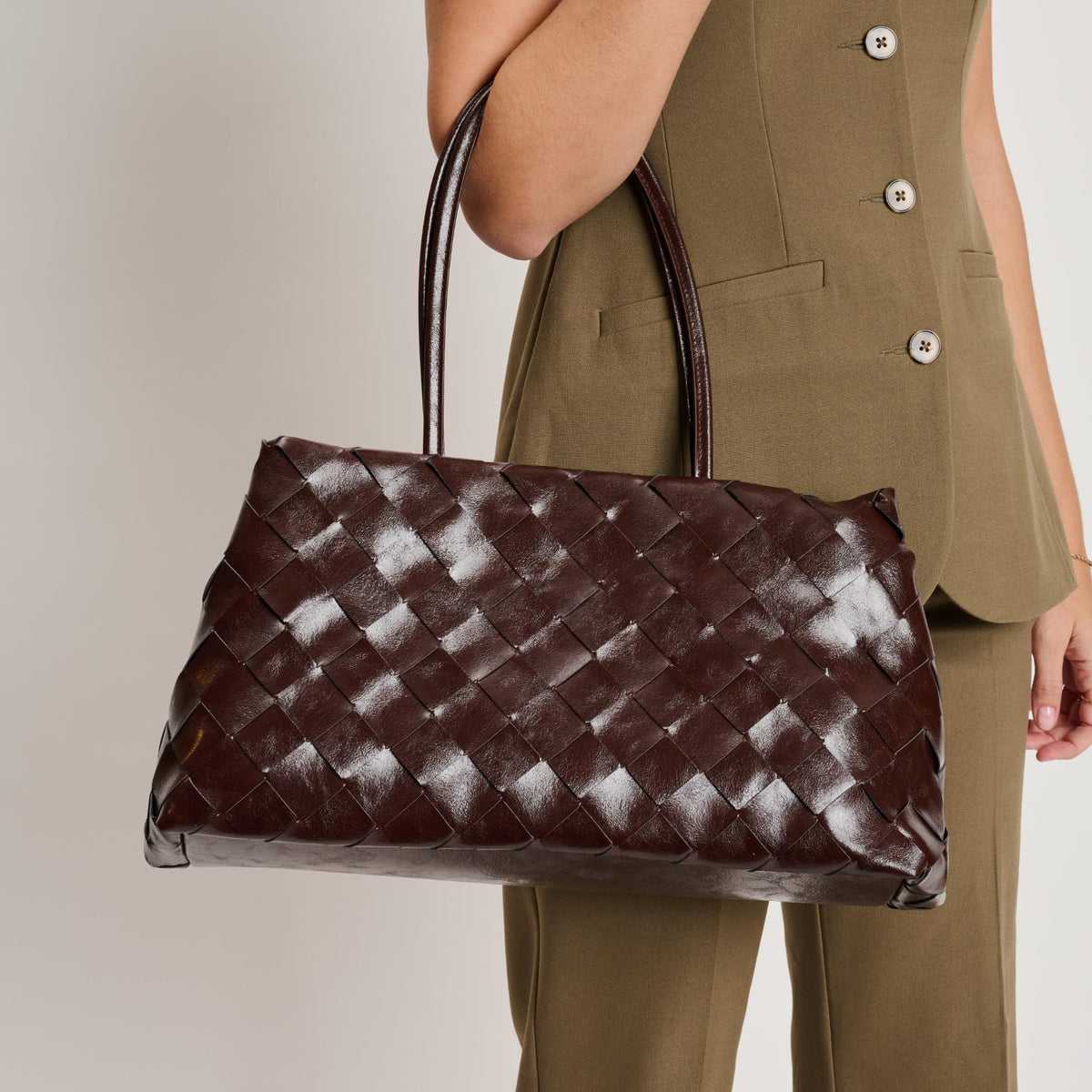 Woman wearing Espresso Moda Luxe Elsy Satchel 842017140948 View 1 | Espresso