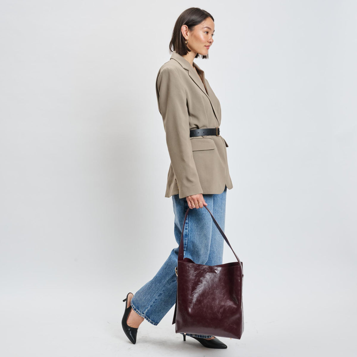 Woman wearing Burgundy Moda Luxe Brooke Bucket 842017139522 View 3 | Burgundy