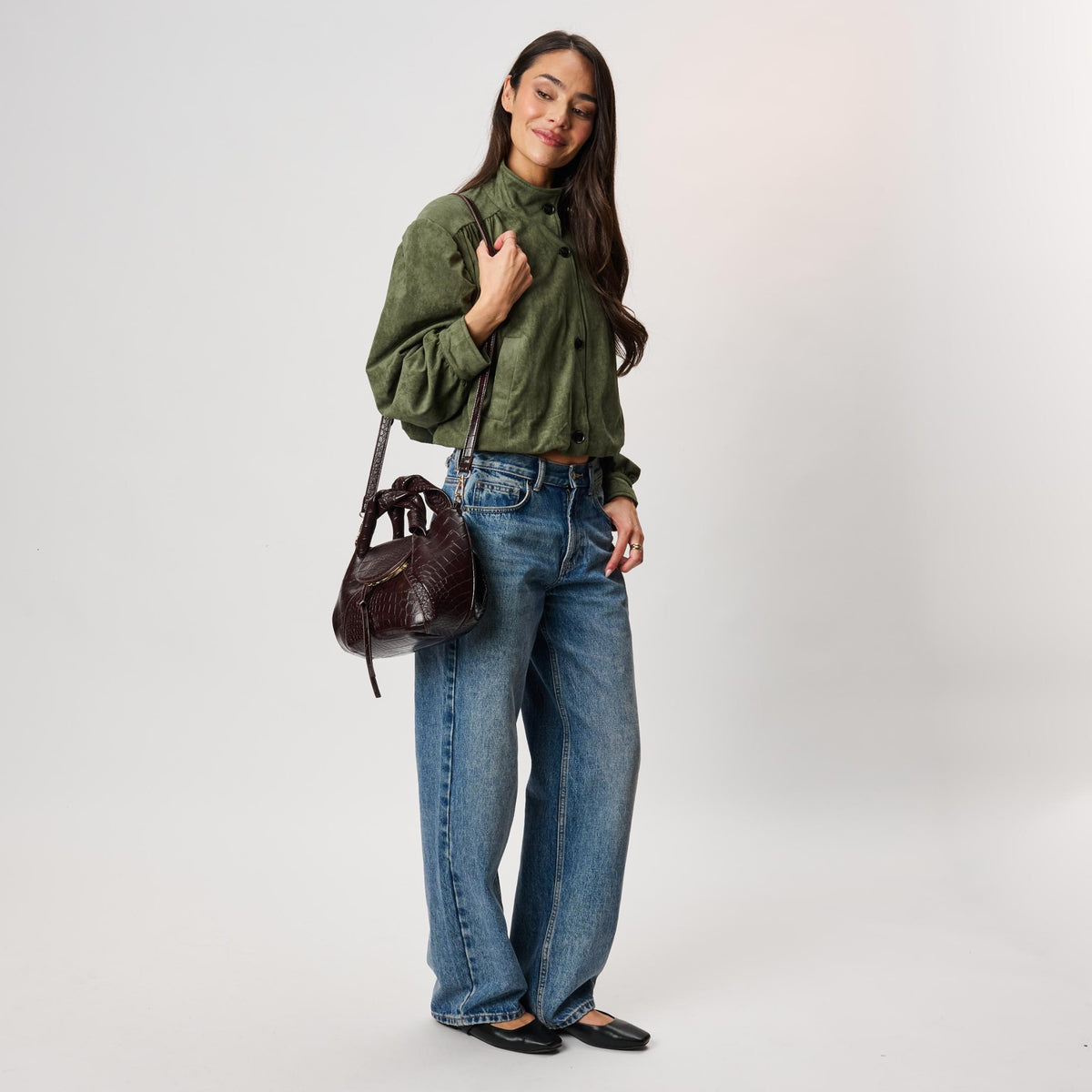 Woman wearing Chocolate Moda Luxe Amaya Satchel 842017142560 View 4 | Chocolate