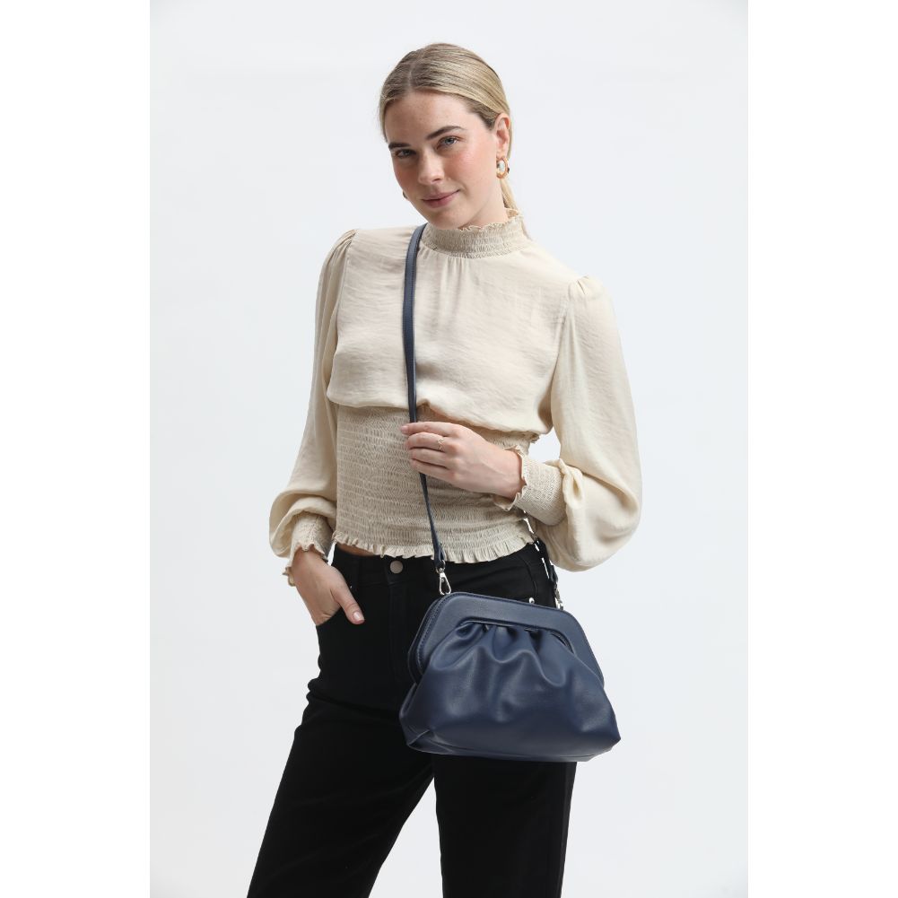 Woman wearing Denim Sol and Selene Charlotte Crossbody 842017134121 View 1 | Denim