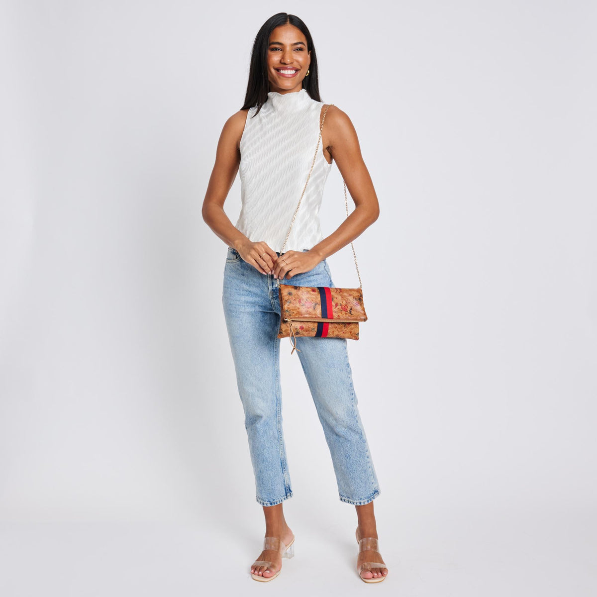 Woman wearing Tan Sol and Selene Jules Print Clutch 842017119418 View 4 | Tan