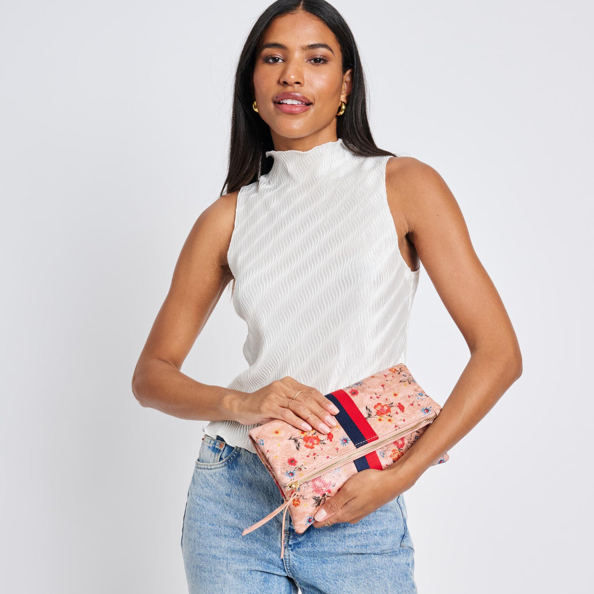 Woman wearing Blush Sol and Selene Jules Print Clutch 842017119425 View 2 | Blush