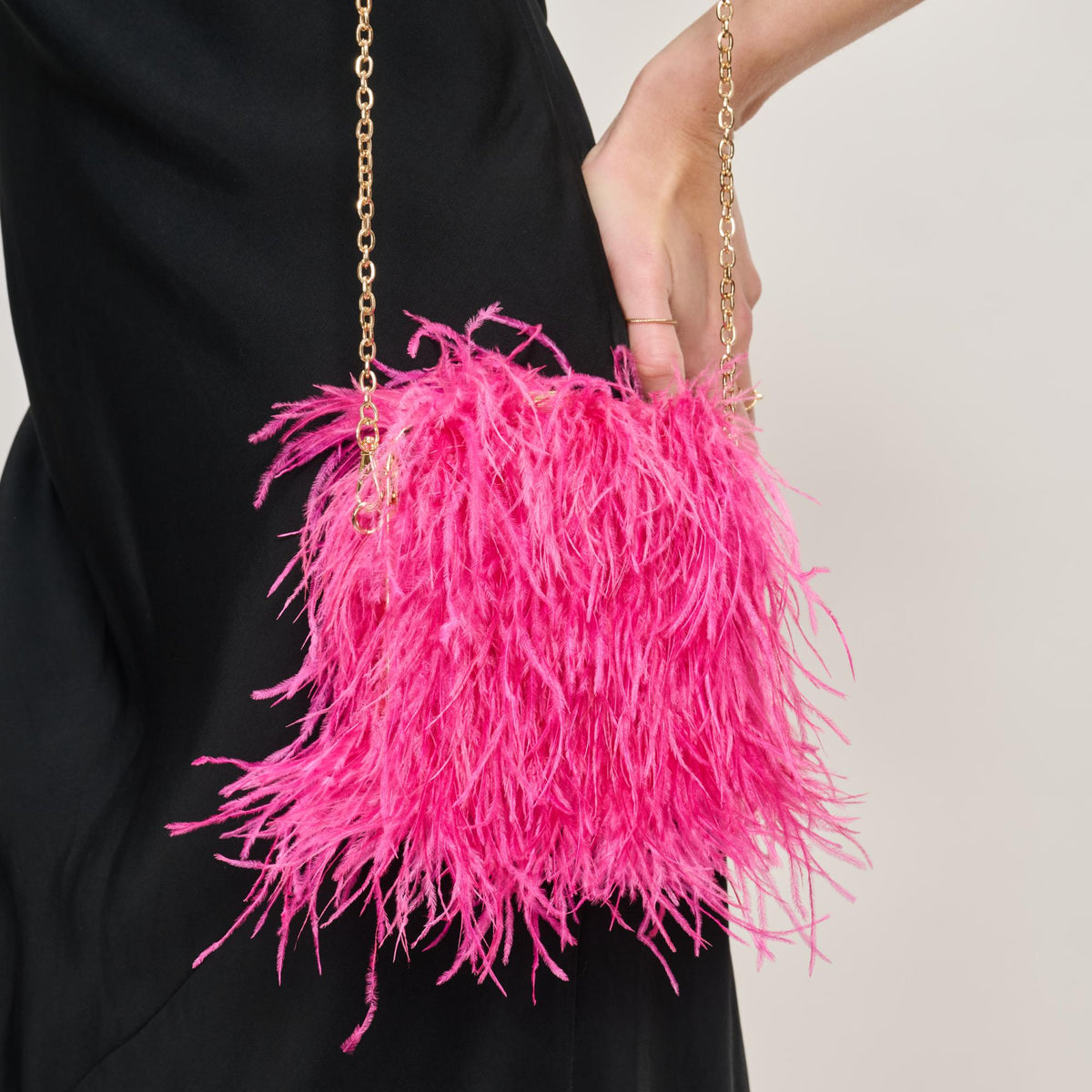 Woman wearing Hot Pink Sol and Selene Feathered Flair Evening Bag 842017138822 View 1 | Hot Pink