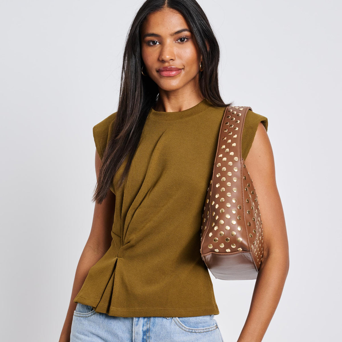 Woman wearing Chocolate Moda Luxe Rebel Crossbody 842017136477 View 2 | Chocolate