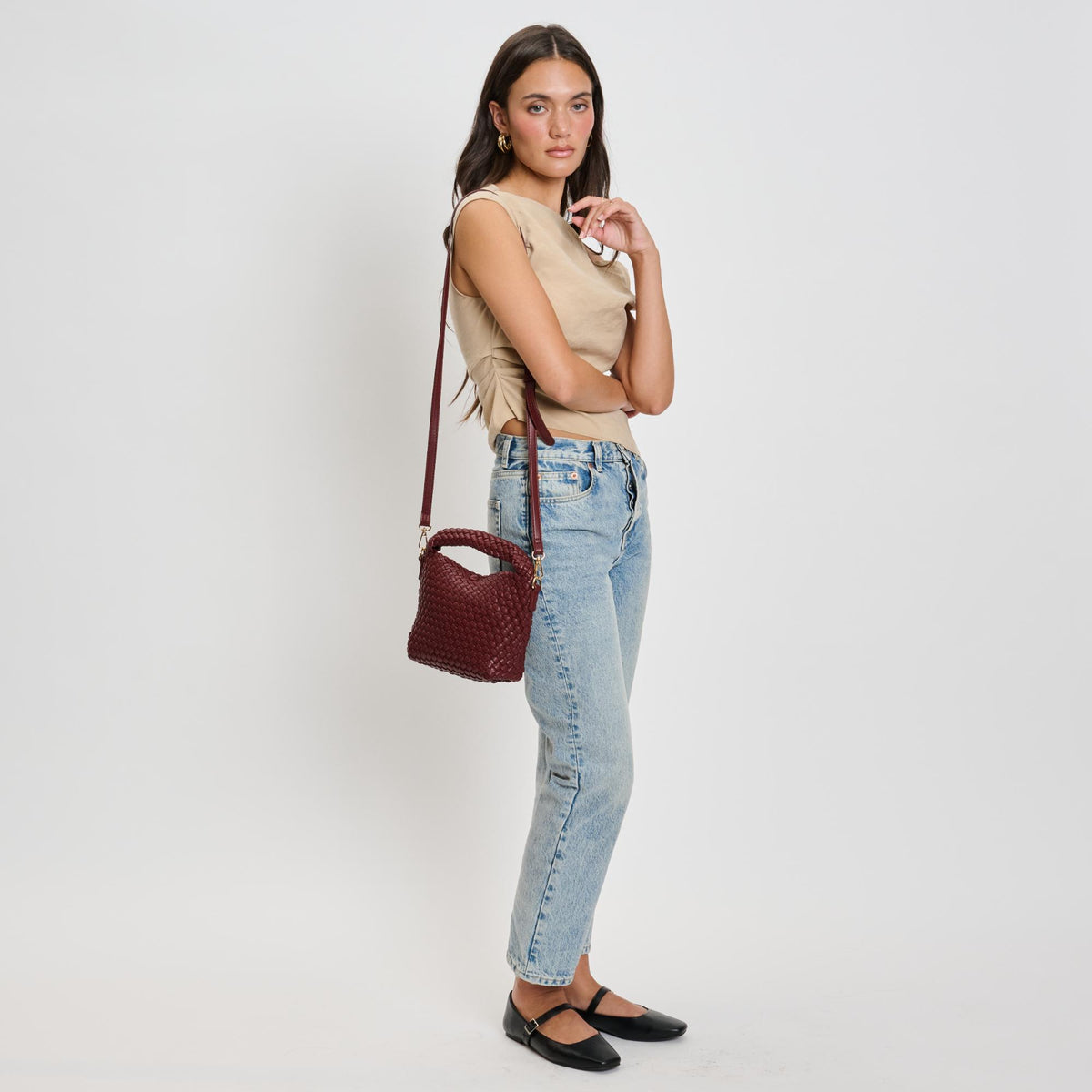 Woman wearing Burgundy Sol and Selene Jessamine Crossbody 842017135708 View 3 | Burgundy
