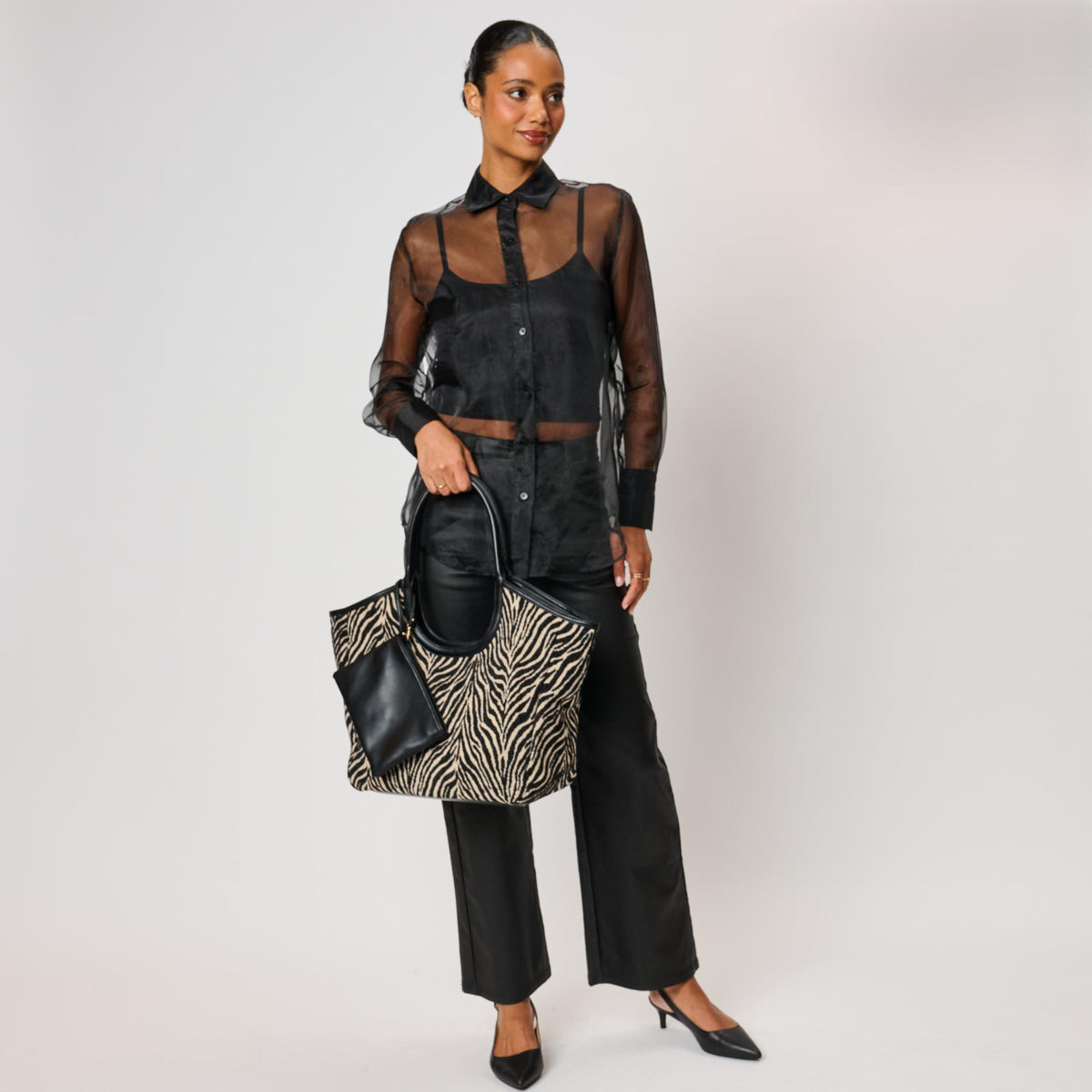 Woman wearing Black Beige Moda Luxe Delilah - Zebra Tote 842017142805 View 4 | Black Beige
