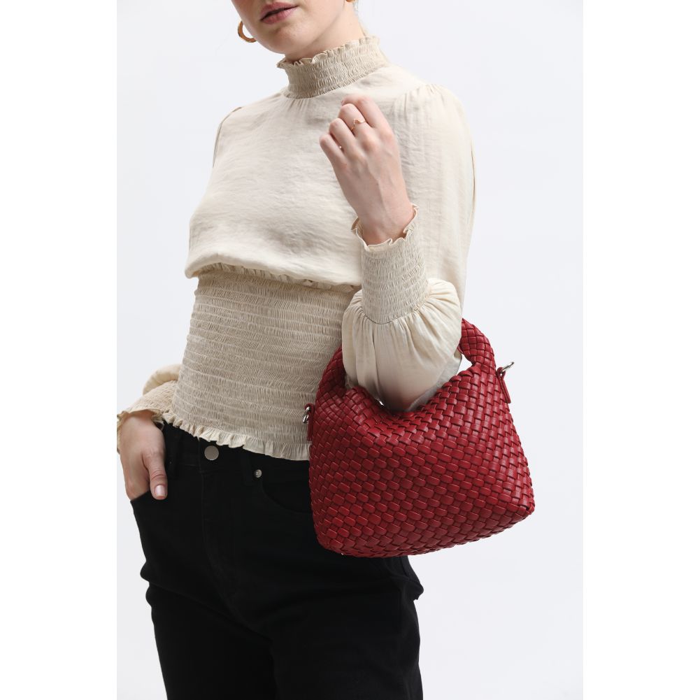 Woman wearing Red Moda Luxe Jessamine Crossbody 842017133056 View 1 | Red