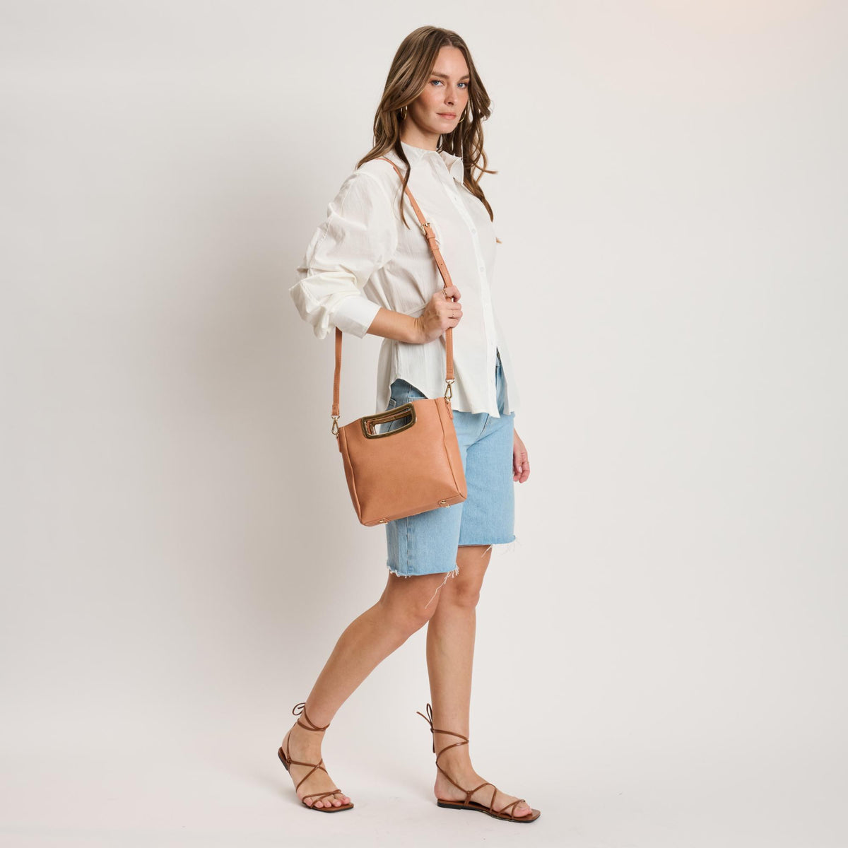 Woman wearing Salmon Moda Luxe Brielle Crossbody 842017141501 View 4 | Salmon