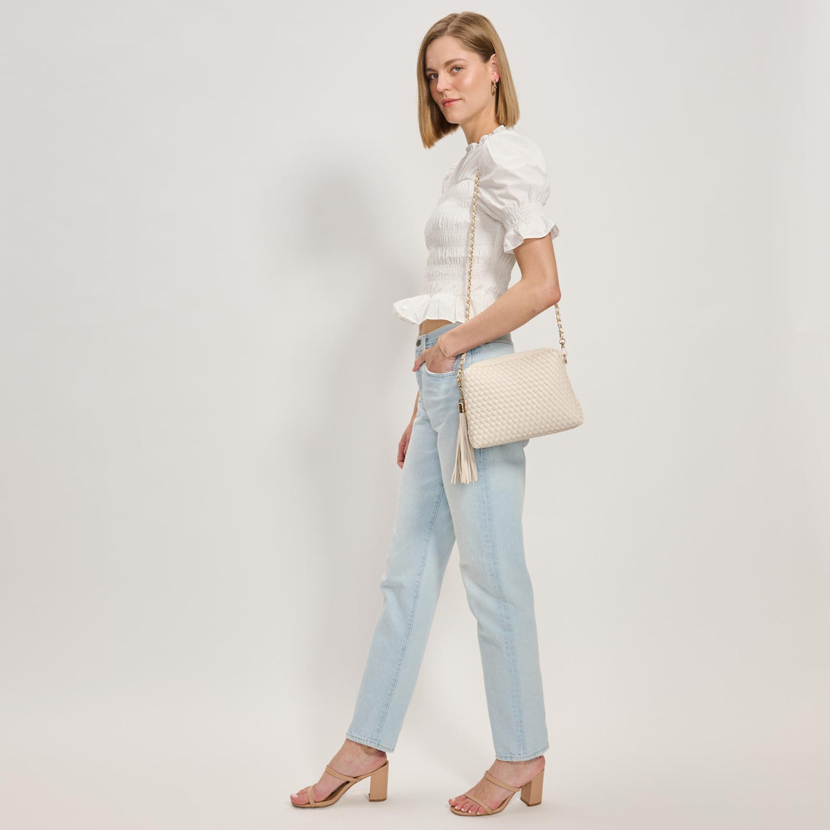 Woman wearing Ivory Moda Luxe Roxana Crossbody 842017137436 View 2 | Ivory