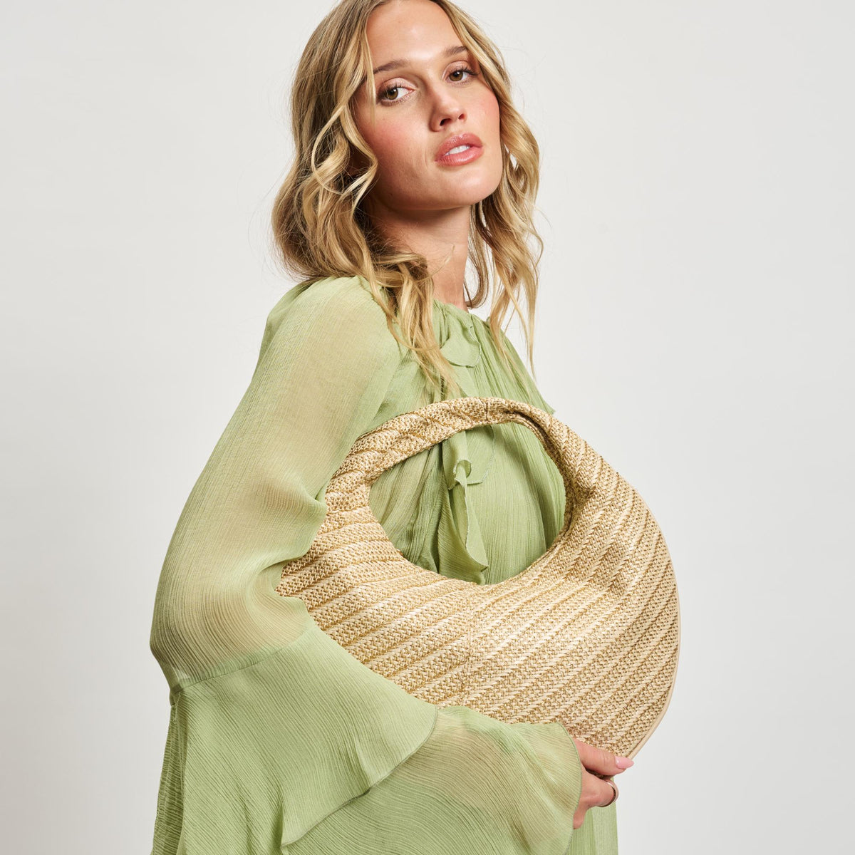 Woman wearing Gold Moda Luxe Farrah - Straw Hobo 842017138693 View 4 | Gold