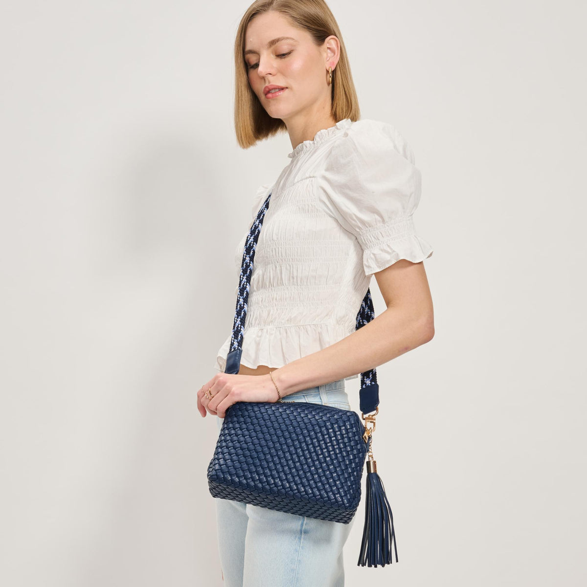 Woman wearing Navy Moda Luxe Roxana Crossbody 842017137467 View 3 | Navy