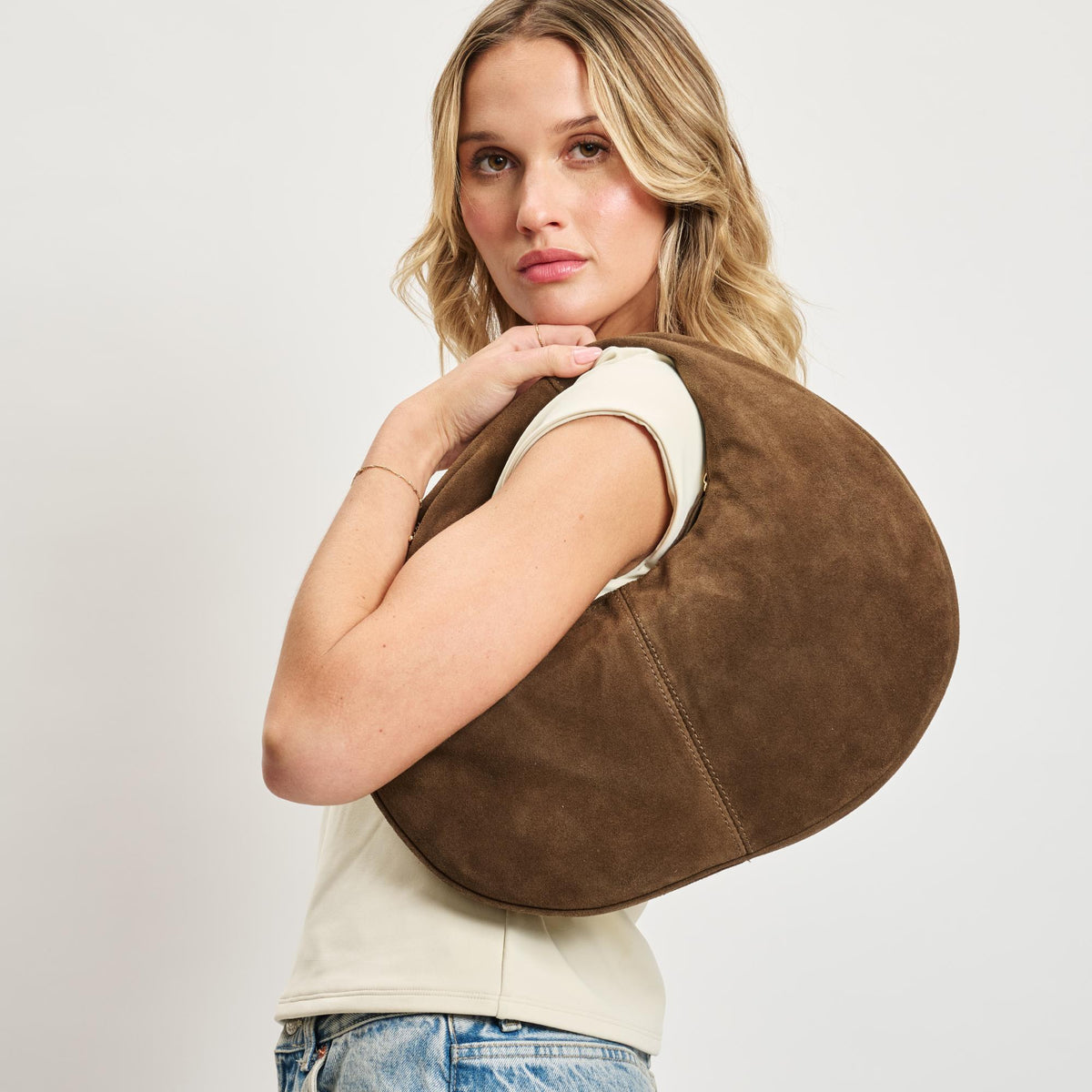 Woman wearing Chocolate Moda Luxe Farrah - Suede Hobo 842017138631 View 1 | Chocolate