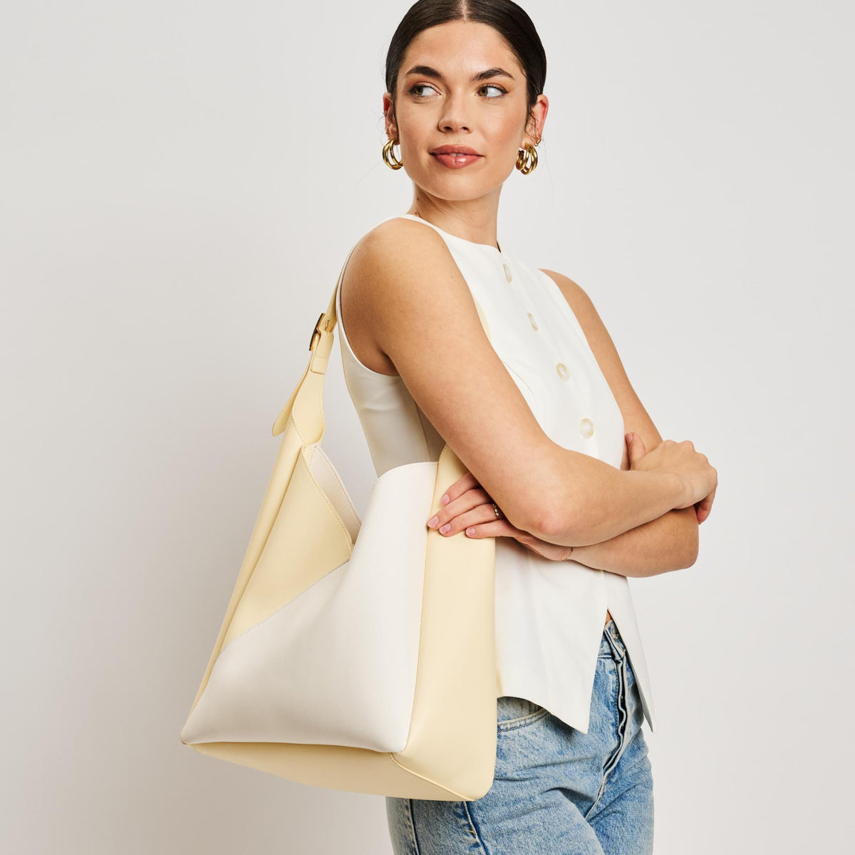 Woman wearing Ivory Butter Sol and Selene Frankie Hobo 842017138549 View 2 | Ivory Butter