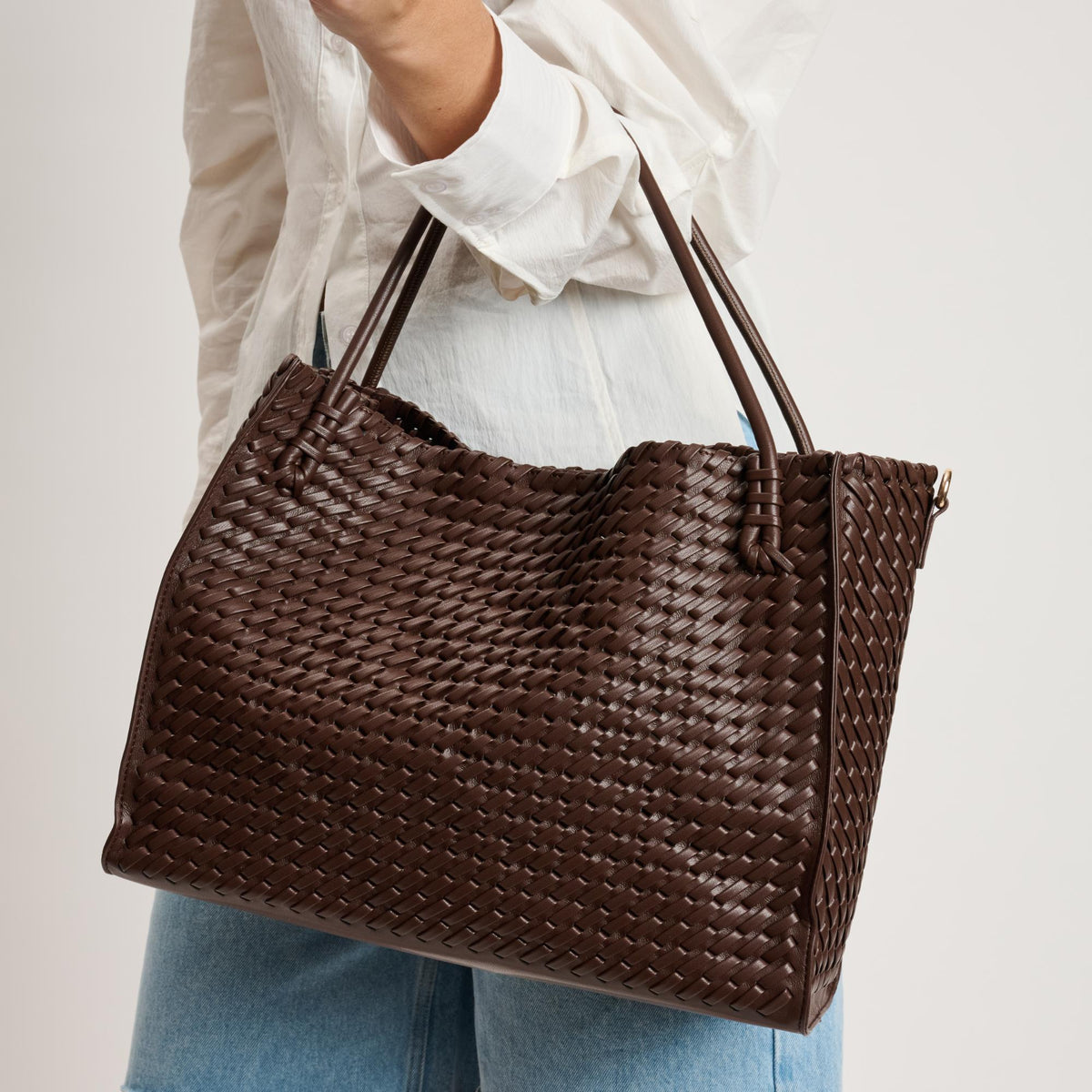 Woman wearing Chocolate Moda Luxe Jackie Tote 842017140825 View 1 | Chocolate