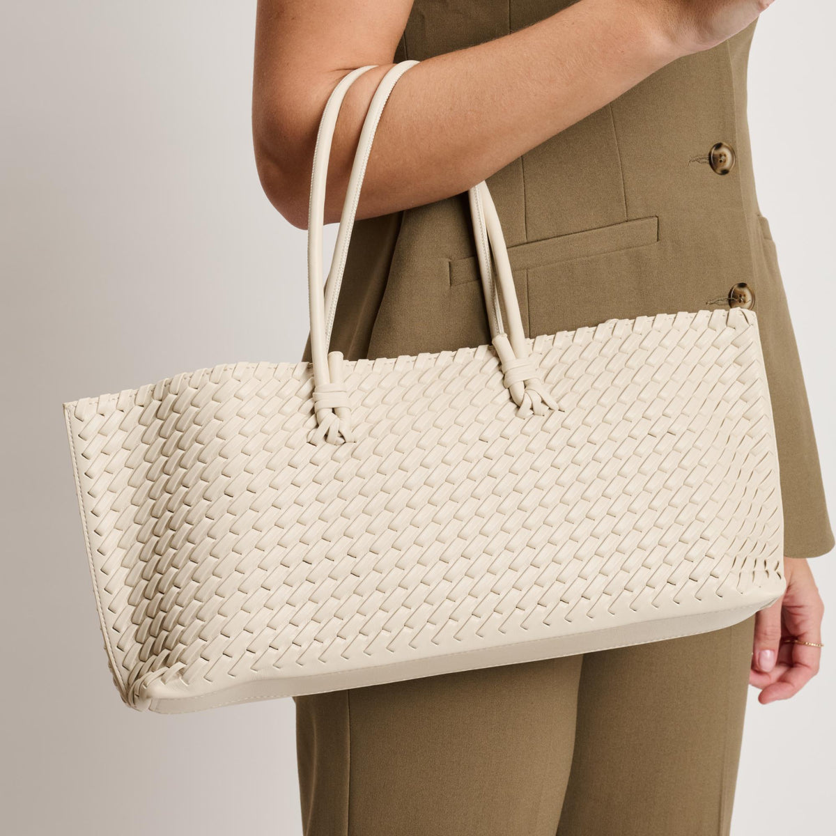 Woman wearing Cream Moda Luxe Nola Tote 842017140887 View 1 | Cream