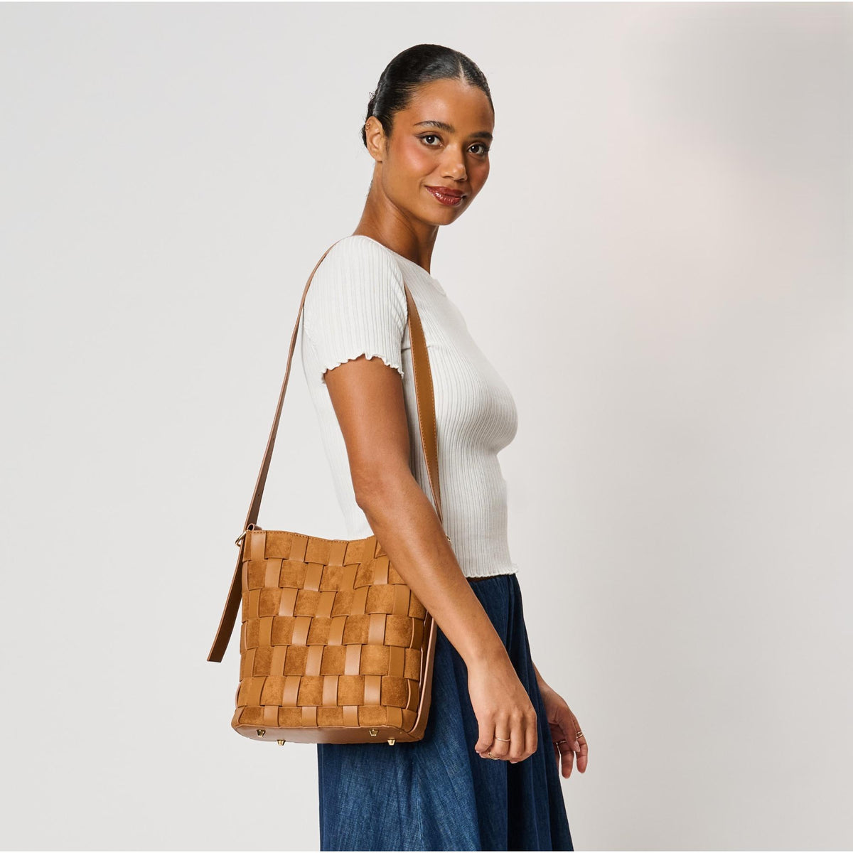 Woman wearing Tan Moda Luxe Naomi Bucket 842017142645 View 1 | Tan