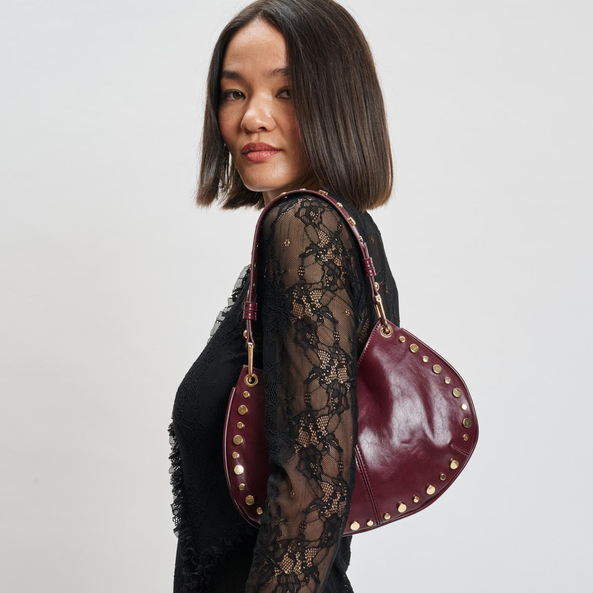 Woman wearing Wine Sol and Selene Nova Crossbody 842017139645 View 2 | Wine