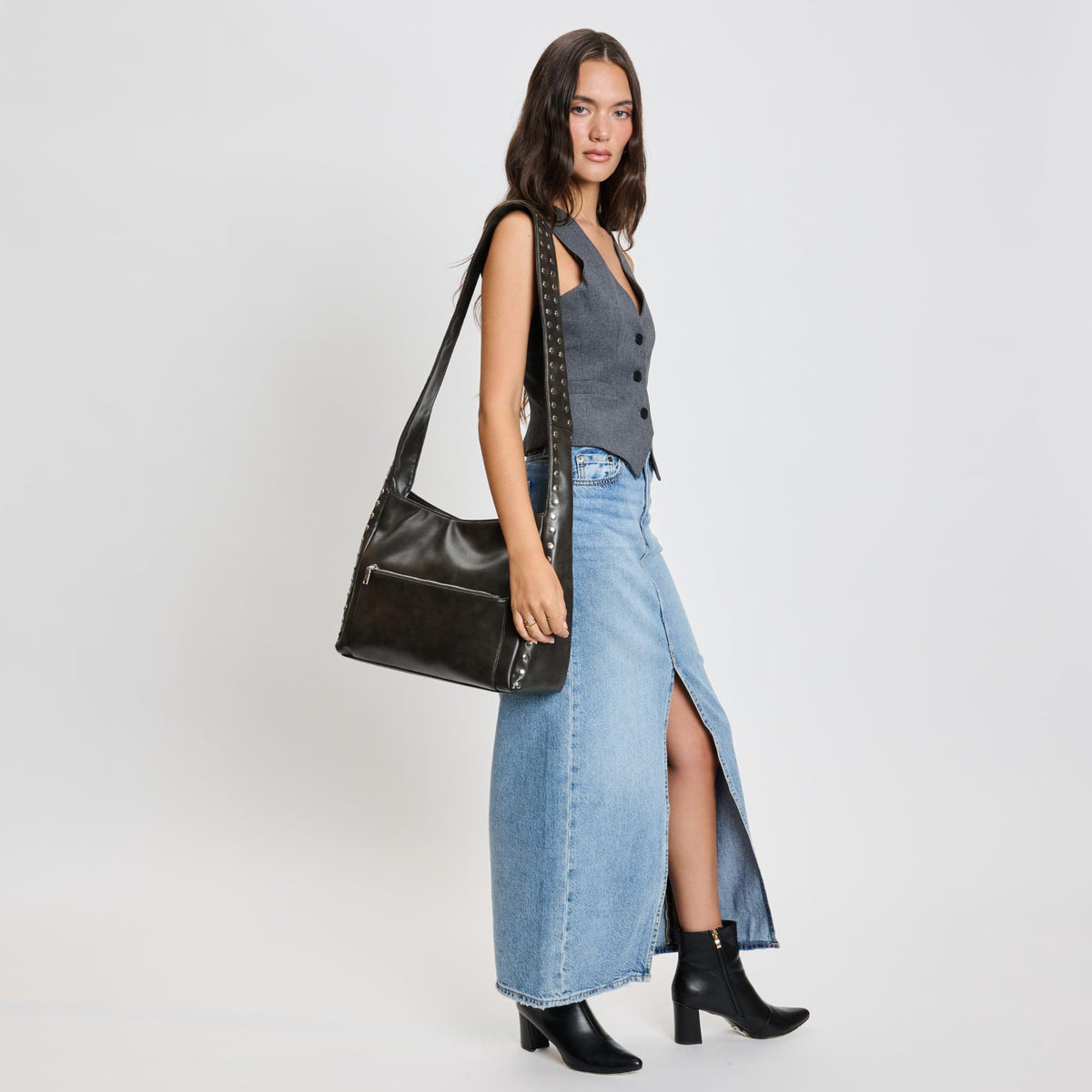 Woman wearing Gunmetal Moda Luxe Electra Crossbody 842017136170 View 2 | Gunmetal