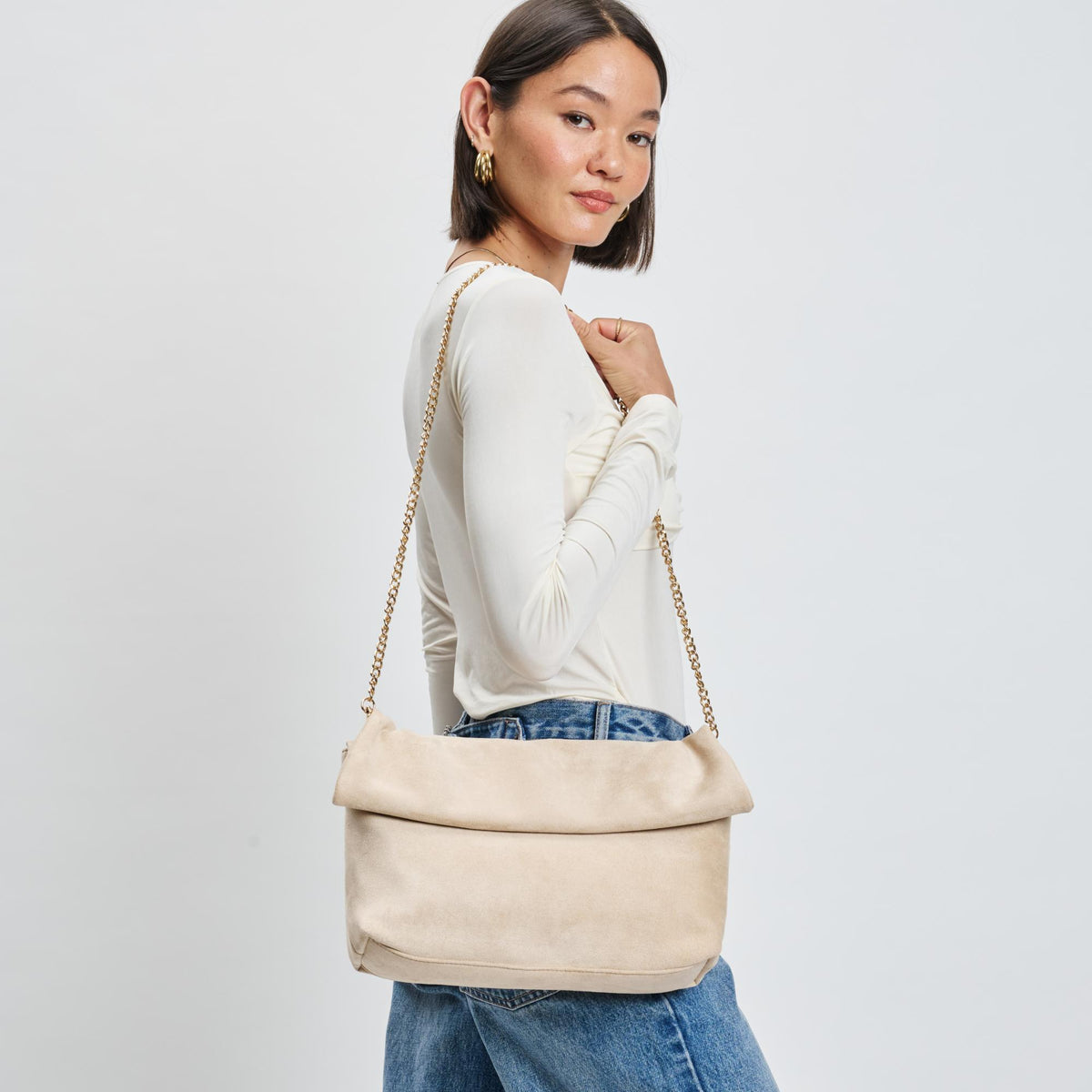 Woman wearing Natural Moda Luxe Zarae Crossbody 842017139980 View 1 | Natural
