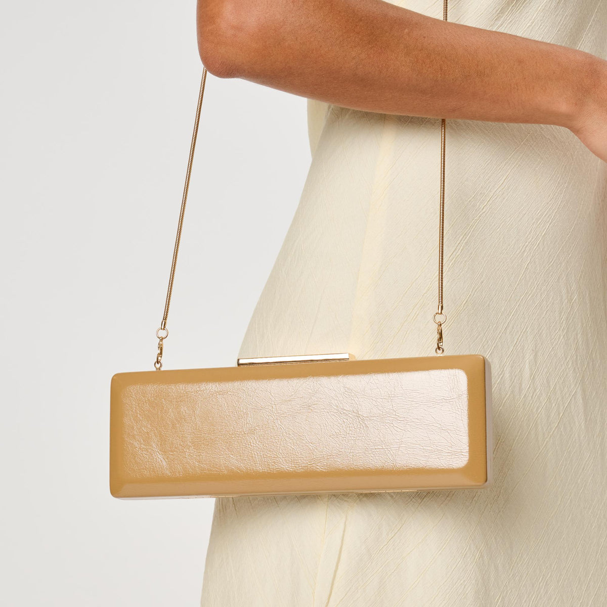 Woman wearing Camel Moda Luxe Angie Clutch 842017142492 View 1 | Camel