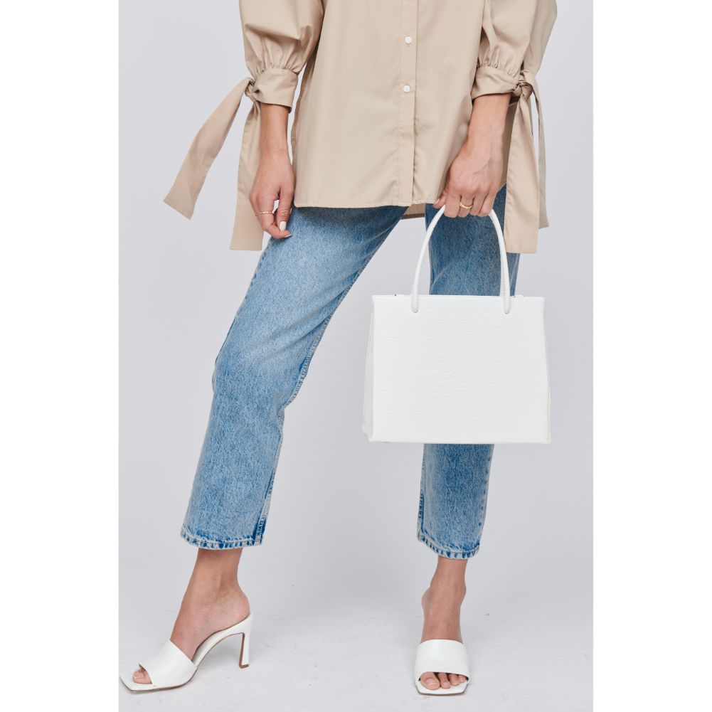 Woman wearing White Moda Luxe Pierce Mini Tote 842017125075 View 1 | White