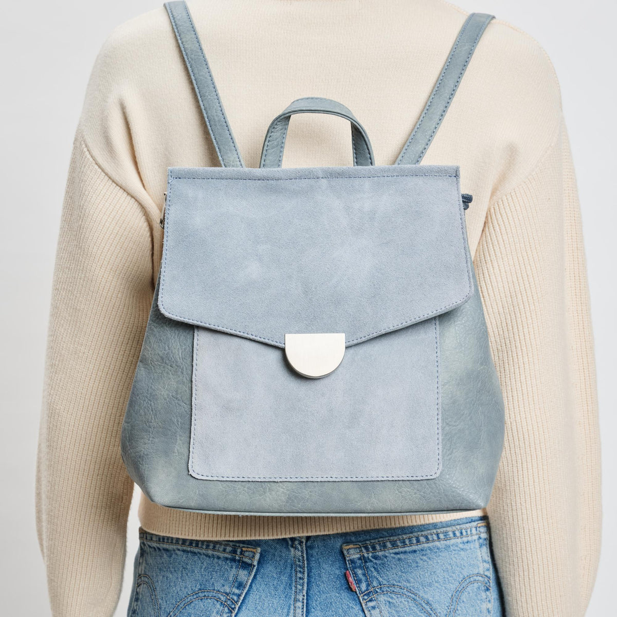 Woman wearing Light Blue Moda Luxe Lynn Backpack 842017139867 View 1 | Light Blue